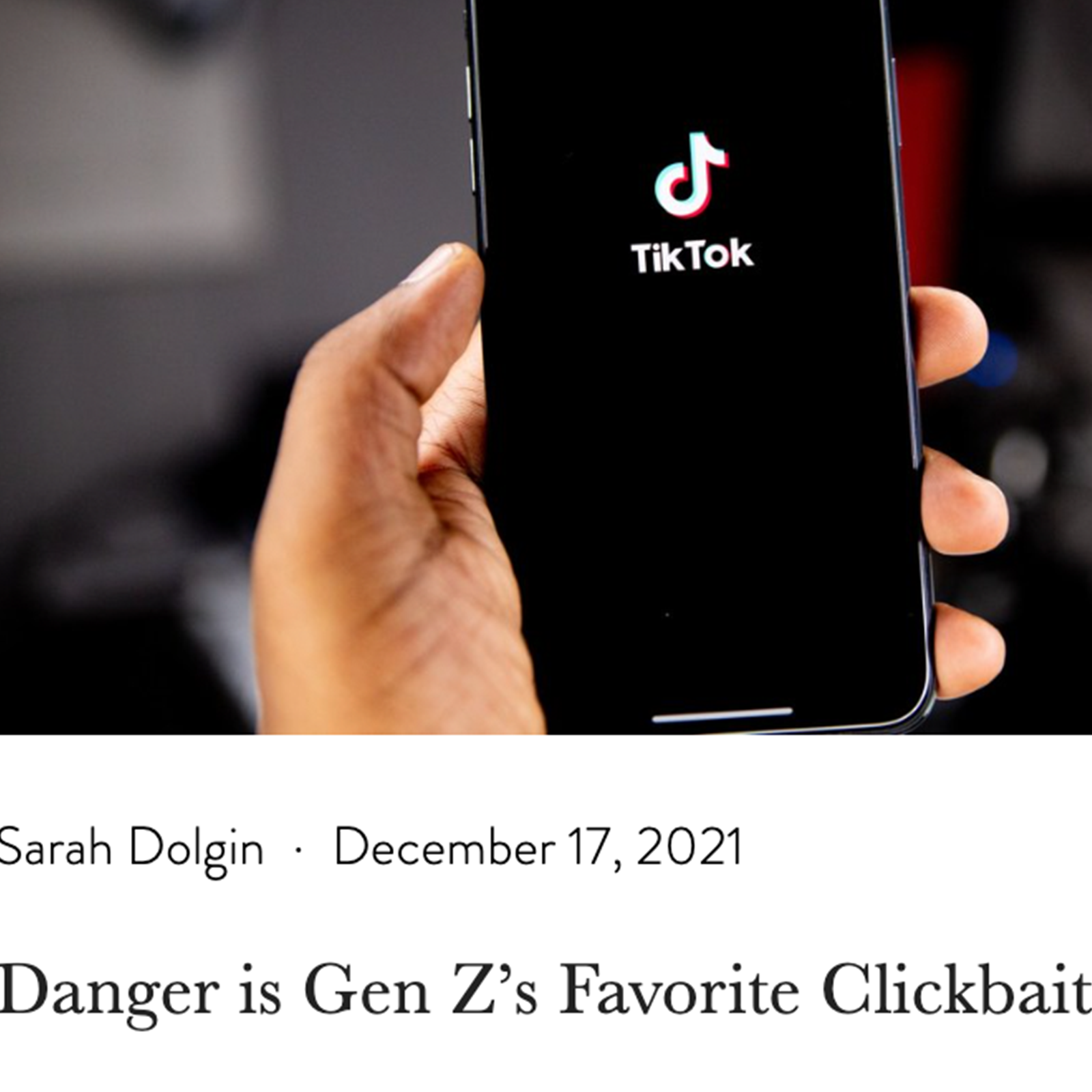photo of someone holding their phone open to the TikTok app