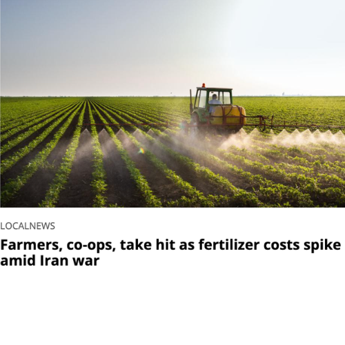Farmer spraying a field