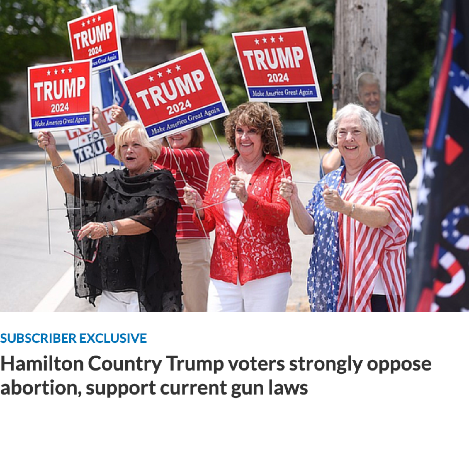 Chattanooga Trump supporters hold signs